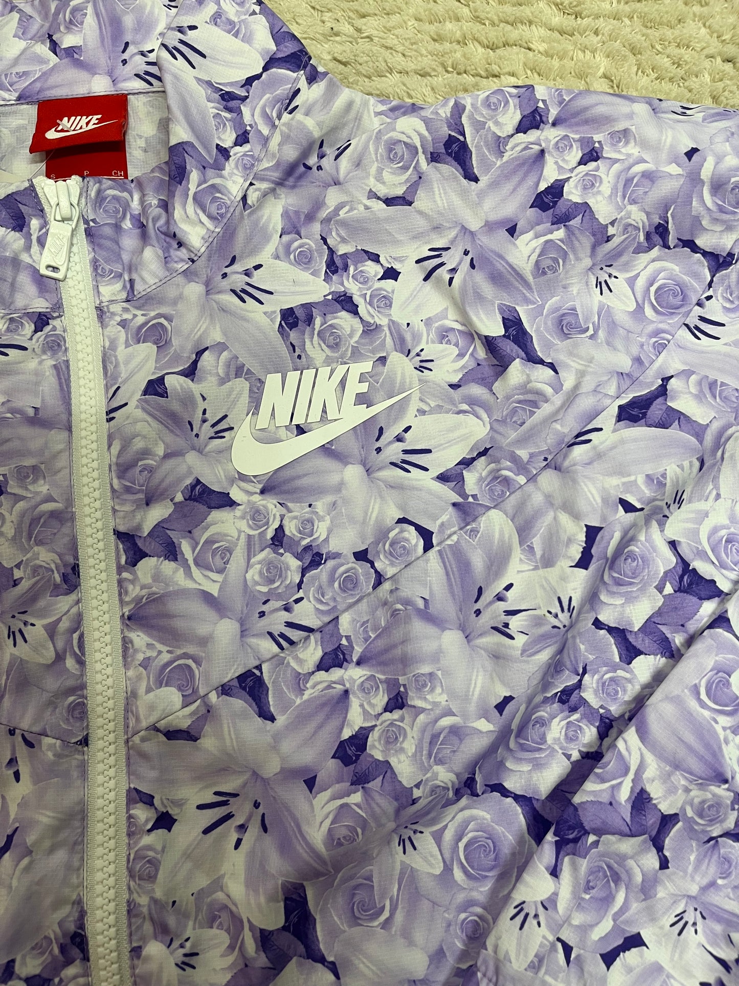 Veste coupe vent Nike - Motifs floral