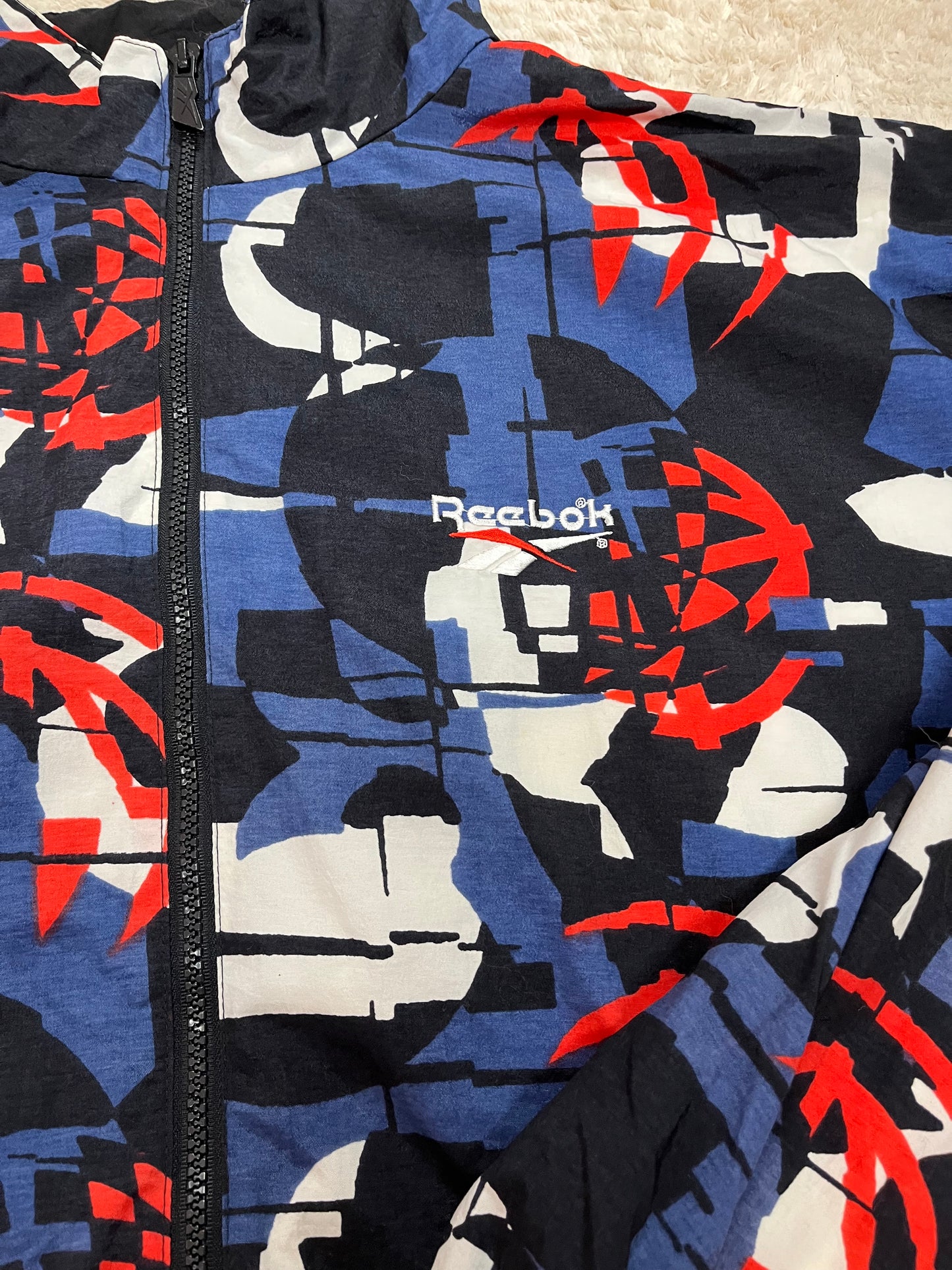 Veste de survêtement Reebok vintage à motifs